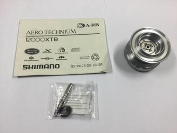 Shimano Aero Technium 12000 XTB.Shimano Aero 4000 FA disponible aux enchères