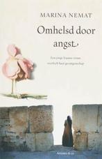 Omhelsd door angst / Marina Nemat, Ophalen of Verzenden, Zo goed als nieuw