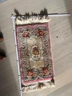 Tapis noué main, Enlèvement