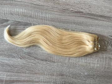 Clip in human hairextensions