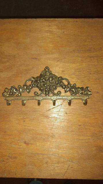 kantieke kapstok in messing beschikbaar voor biedingen