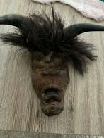 Koloniale masker, Ophalen