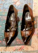 Prada's damesschoenen, Ophalen, Zo goed als nieuw