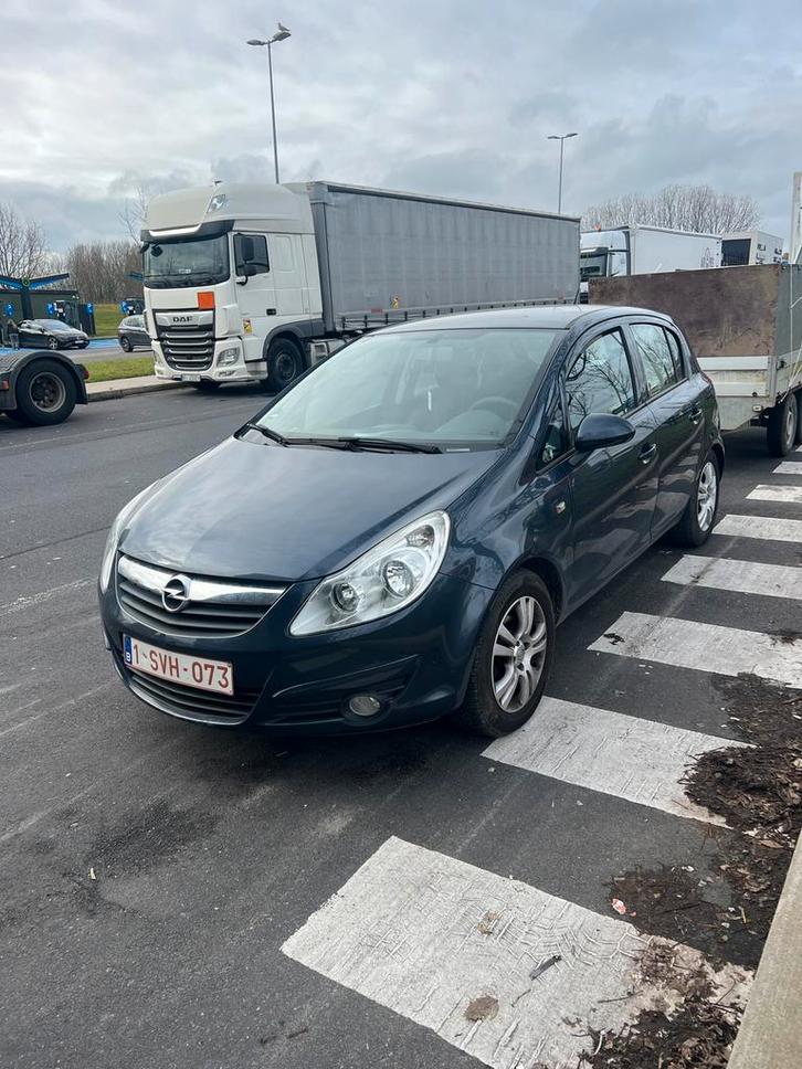Opel Corsa 2009, Auto's, Opel, Particulier, Corsa, Trekhaak, Benzine, Stadsauto, 5 deurs, Handgeschakeld, Blauw, Zwart, Stof, Ophalen