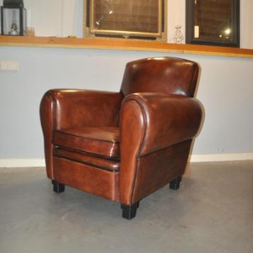 Joop, een schapenleren Art Deco fauteuil beschikbaar voor biedingen