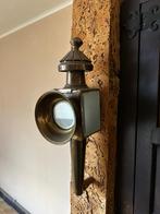 Wandlamp - koetslamp, Ophalen