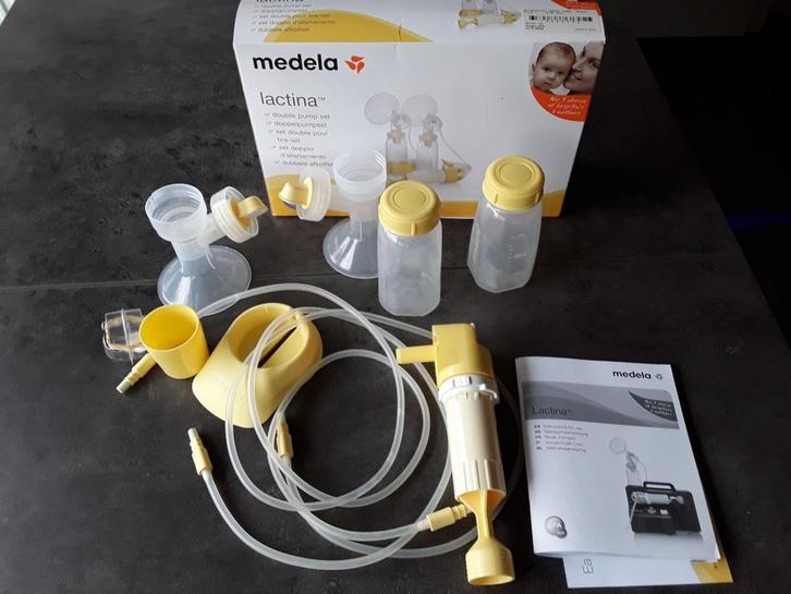 Medela (eenvoudige dubbele afkolfset)met gebruiksaanwijzing., Kinderen en Baby's, Babyvoeding en Toebehoren, Zo goed als nieuw