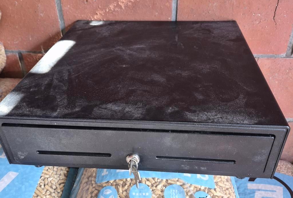 Geldlade (roestvrij staal), Ophalen