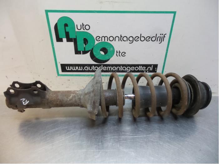 Schokdemperpoot rechts-voor van een Volkswagen Golf (Golf 83, Auto-onderdelen, Ophanging en Onderstel, Volkswagen, Gebruikt, 3 maanden garantie