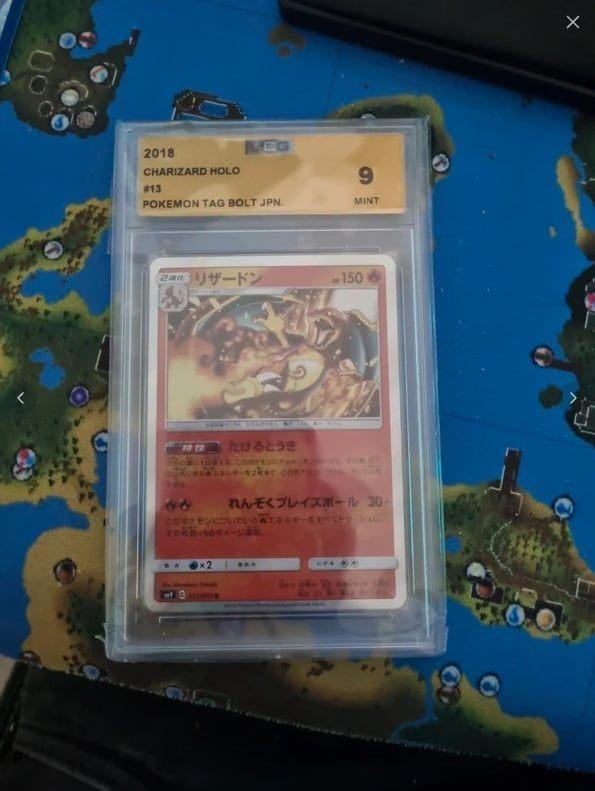 Ucg charizard POKEMON 9mint, Ophalen of Verzenden, Nieuw, Losse kaart
