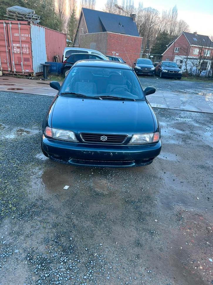 Suzuki Baleno, Autos, Suzuki, Particulier, Baleno, Vitres électriques, Essence, 3 portes, Boîte manuelle, Gris, Tissu, Enlèvement