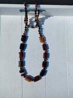 Sensuali halsketting, Handtassen en Accessoires, Kettingen, Ophalen, Zo goed als nieuw, Bruin, Overige materialen