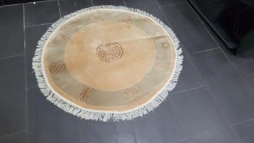 très jolie tapis ronde 1m en parfait état maison non fumeur  beschikbaar voor biedingen