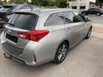 Toyota Auris Touring Sports Hybrid AUTOMAAT NAVI CRUISE MET, Auto's, Euro 5, Stof, Gebruikt, 4 cilinders