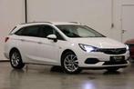 Opel Astra 1.5D Sports Tourer Automaat Full Option, Auto's, 122 pk, Gebruikt, Alcantara, Wit
