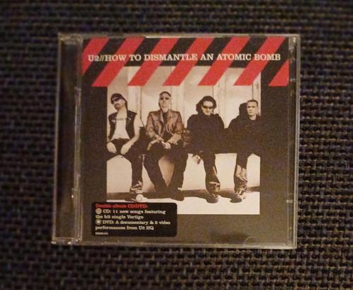 CD + DVD: U2: How to dismantle an atomic bomb (Island record, CD & DVD, CD | Rock, Comme neuf, Pop rock, Enlèvement ou Envoi