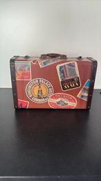 Vintage reiskoffertje, Ophalen