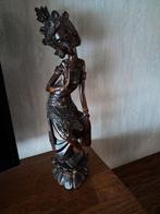 houten beeld, Ophalen