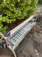 Tegelzaagmachine, Ophalen