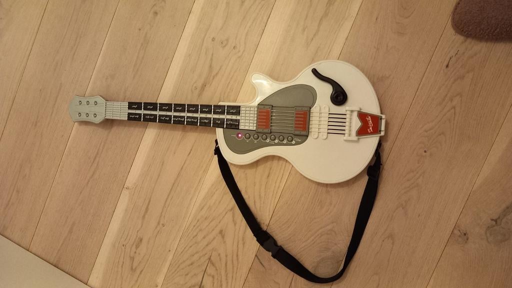 Elektrische speelgoedgitaar, Ophalen, Gebruikt