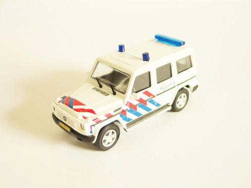 1/43 - M Cararama - Mercedes Benz Classe G Police néerlandai, Hobby & Loisirs créatifs, Voitures miniatures | 1:43, Neuf, Enlèvement ou Envoi