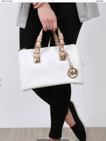 Sac Boston blanc signé Michael Kors Jet Set Inest Pretty disponible aux enchères