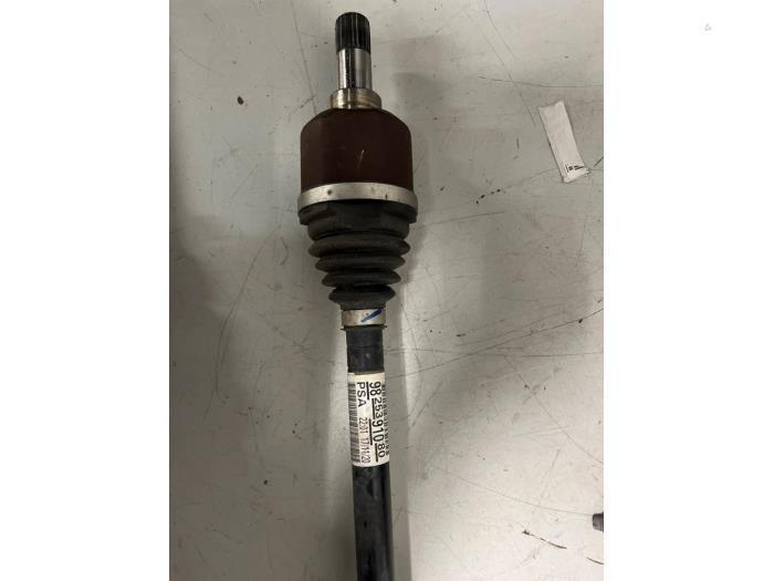 Aandrijfas links-voor van een Opel Corsa, Auto-onderdelen, Remmen en Aandrijving, Opel, Gebruikt, 3 maanden garantie, Ophalen of Verzenden
