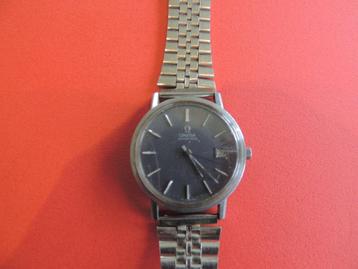 montre omega 1974 rare cadran gris