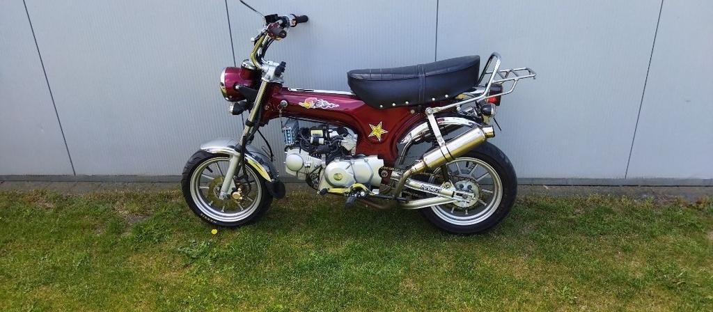 Zeer dikke Dax klasse a, Fietsen en Brommers, Ophalen