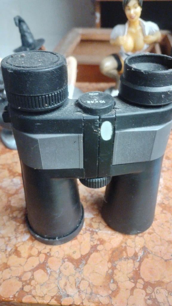 Verrekijker 10 x 42, Ophalen