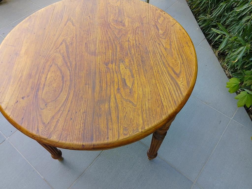 Ronde massieve eettafel, Ophalen