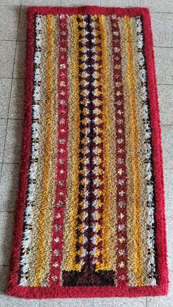 Tapis en laine fait main, Enlèvement