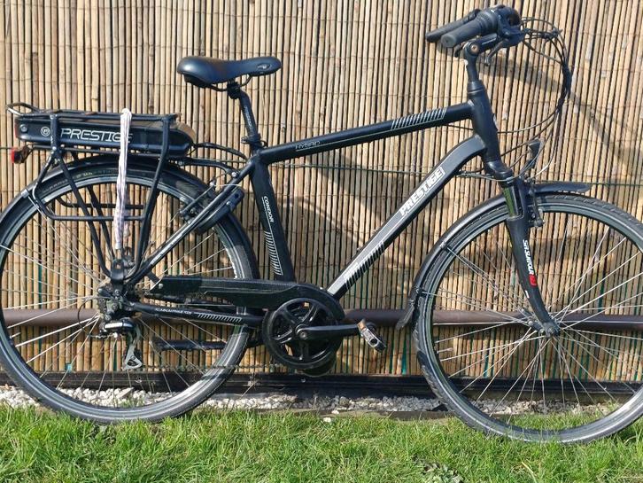 elektrische herenfiets, Fietsen en Brommers, Elektrische fietsen, Zo goed als nieuw, 55 tot 59 cm, 50 km per accu of meer, Ophalen
