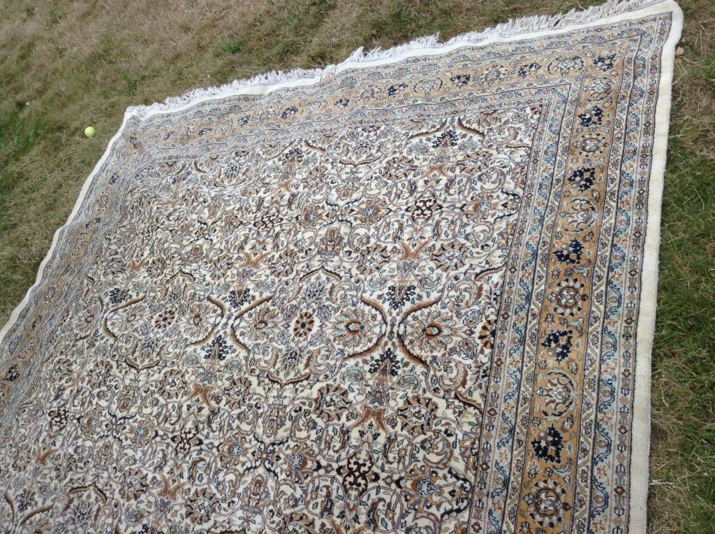 perzisch tapijt, Ophalen