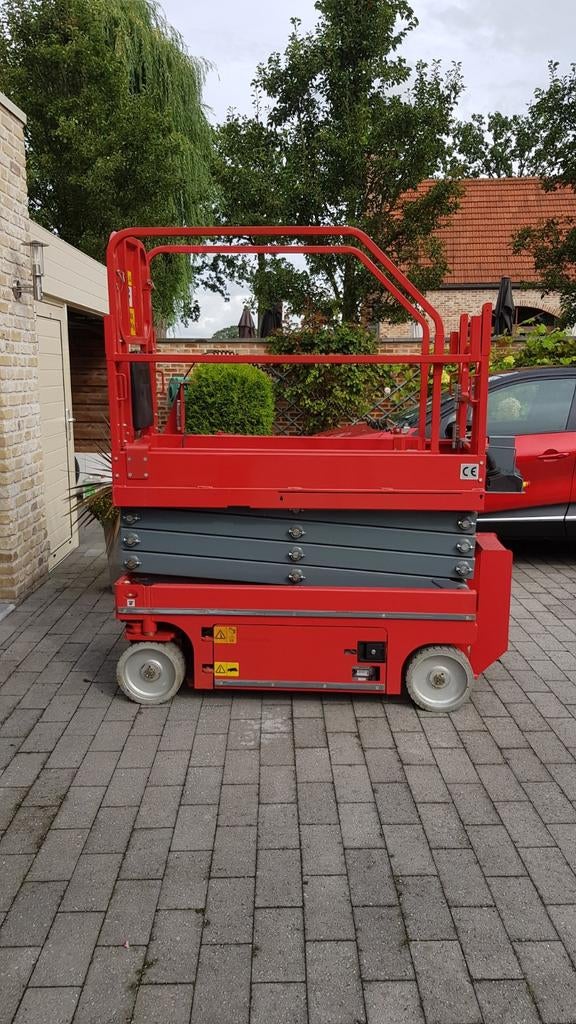 Hoogwerker 6.5m hoog., Zakelijke goederen, Machines en Bouw | Liften, Steigers en Ladders, Ophalen