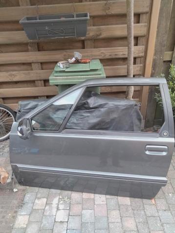 Volvo 480 linker voordeur - donkergrijs beschikbaar voor biedingen