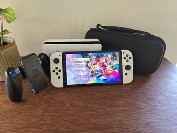 Nintendo Switch OLED blanche + Mario Kart 8 Deluxe + Housse beschikbaar voor biedingen