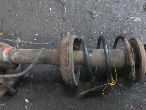 Schokdemperpoot links-voor van een Renault Twingo, Auto-onderdelen, Ophanging en Onderstel, Renault, Gebruikt, 3 maanden garantie