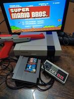 Nintendo NES action set super Mario Bros, Ophalen of Verzenden, Zo goed als nieuw, Met 3 controllers of meer, Met games
