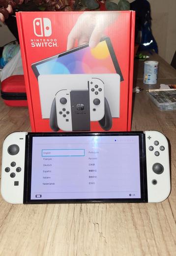 Console Nintendo Switch oled + housse +++++ niquel beschikbaar voor biedingen