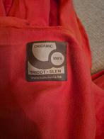 Tricot-Slen draagdoek oranje, Ophalen