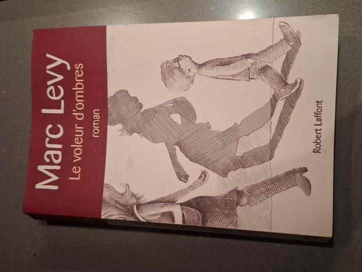 Marc Levy - Le Voleur D'Ombres, Boeken, Romans, Zo goed als nieuw, Ophalen of Verzenden