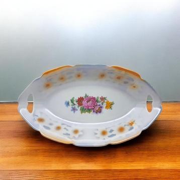 Assiette apéritive en porcelaine vintage, décor floral disponible aux enchères