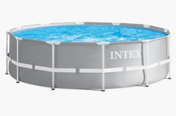 Intex 457 x 107 sterk rond zwembad met trap en pomp. beschikbaar voor biedingen