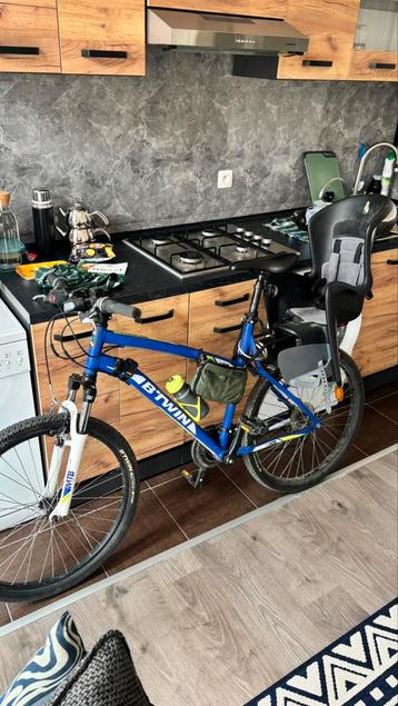 VTT B’Twin en excellent état + siège enfant beschikbaar voor biedingen