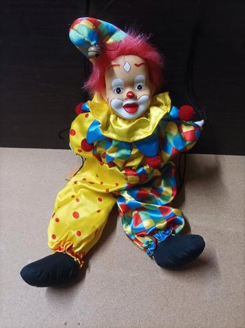 Clown sur balançoire grand format