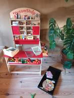 Houten winkeltje met houten en plastieke winkelwaren., Ophalen