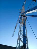 snelmontage bouwkraan te koop max 1500kg giek 22m, Enlèvement, Grue