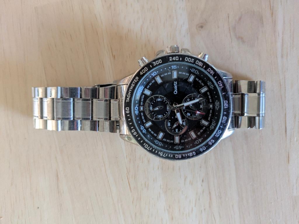 Montre sportive pour homme - cadran noir - bracelet en acier, Enlèvement, Comme neuf, Montre-bracelet