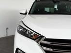 Hyundai Tucson 1.6 T-GDi 4WD *BOITE AUTO*CUIR*TOIT OUVR.*CAM, Auto's, Automaat, Gebruikt, 4 cilinders, Wit